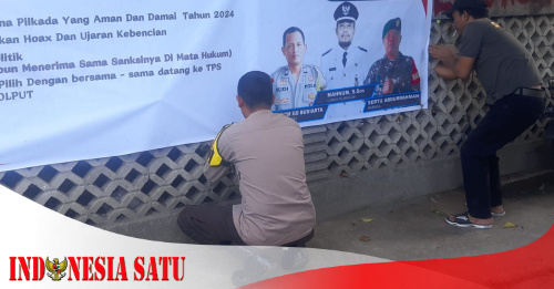 Bhabinkamtibmas Polsek Mataram Pasang Spanduk Ciptakan Suasana Pilkada Aman Dan Damai